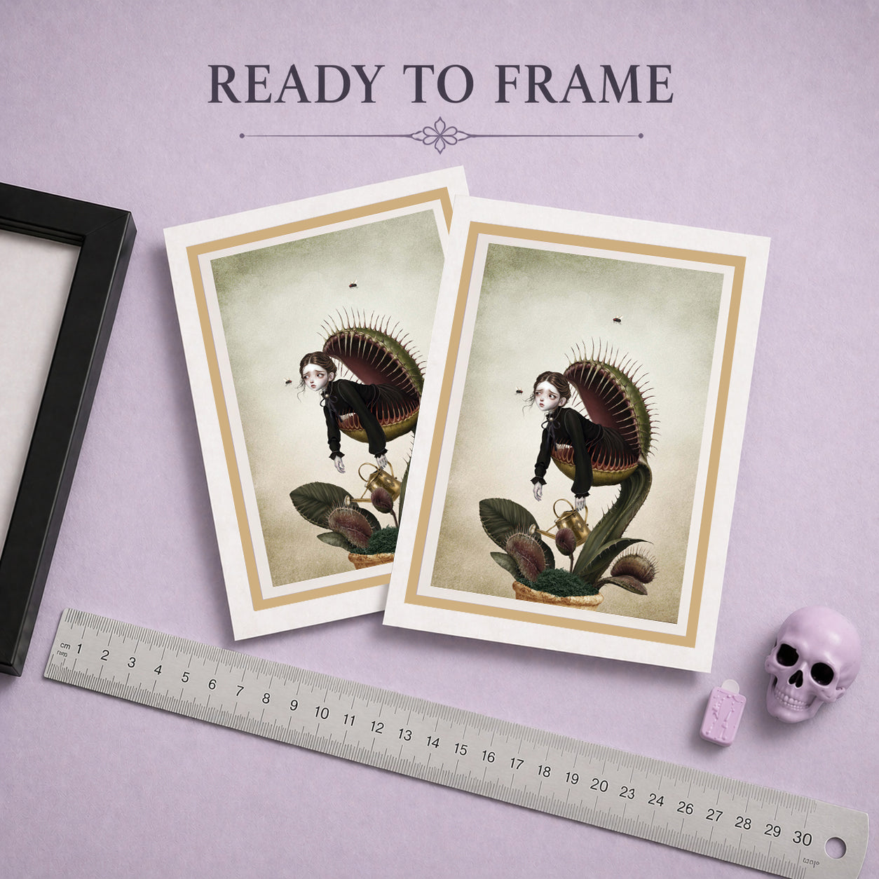 Ready to frame Victorian gothic  art greeting card featuring an illustration of a girl inside a Venus flytrap, displayed upright on its white envelope next to a small ceramic vase with dried lavender and baby's breath flowers on a light purple background.