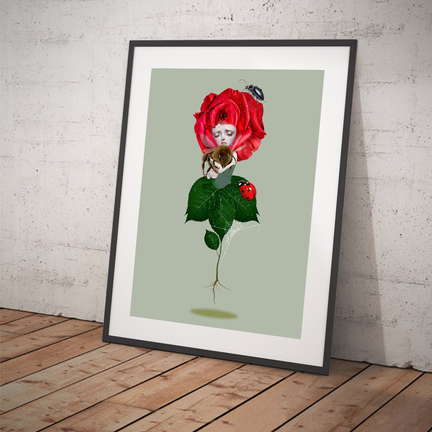 Black framed Art Print captures the delicate beauty of a sad red rose and a bumblebee, evoking a sense of melancholy and loss.