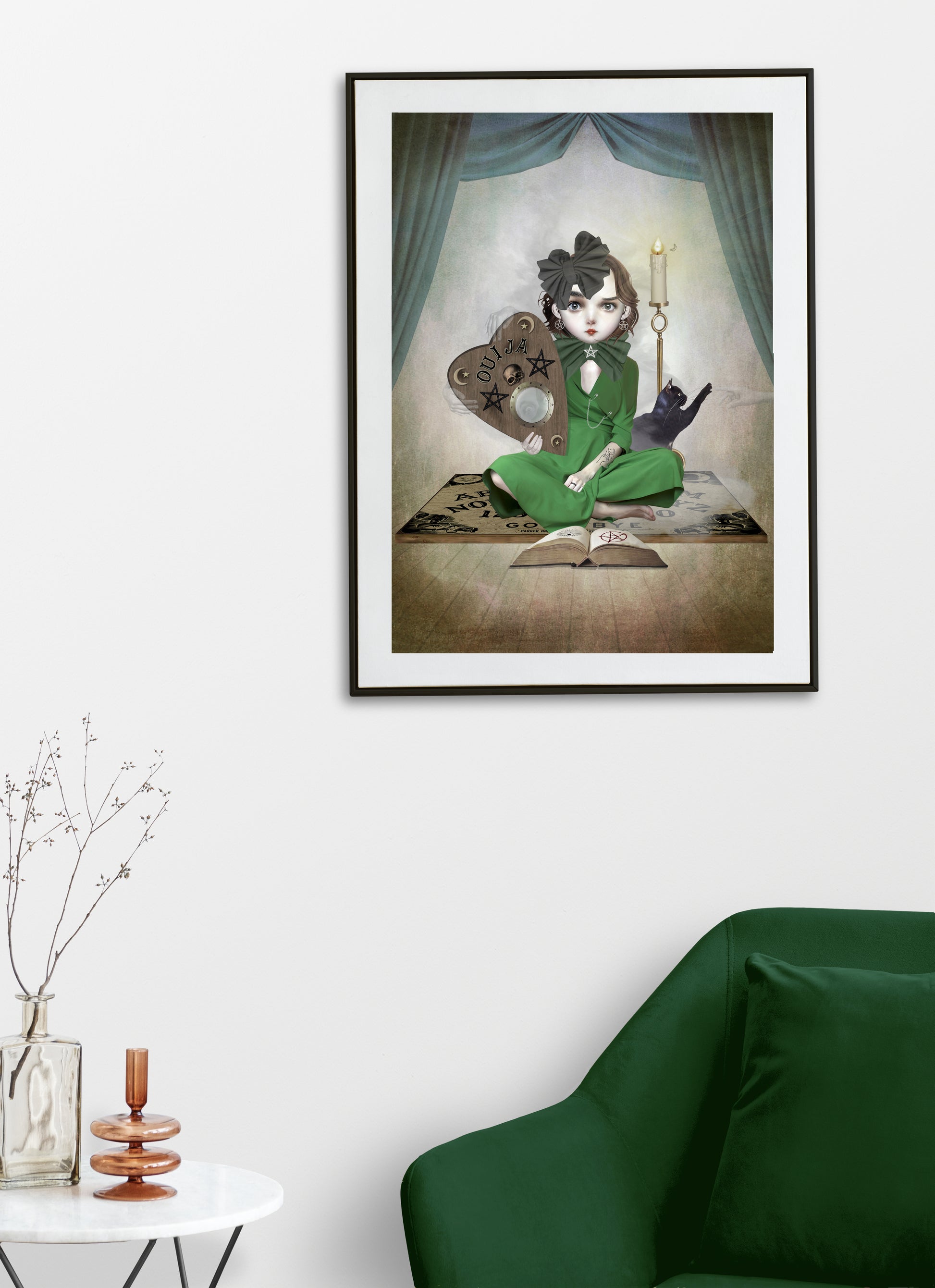 Girl and ouija board art print hanging on the wall of a modern living room. Perfect for adding a paranormal touch to your home decor.