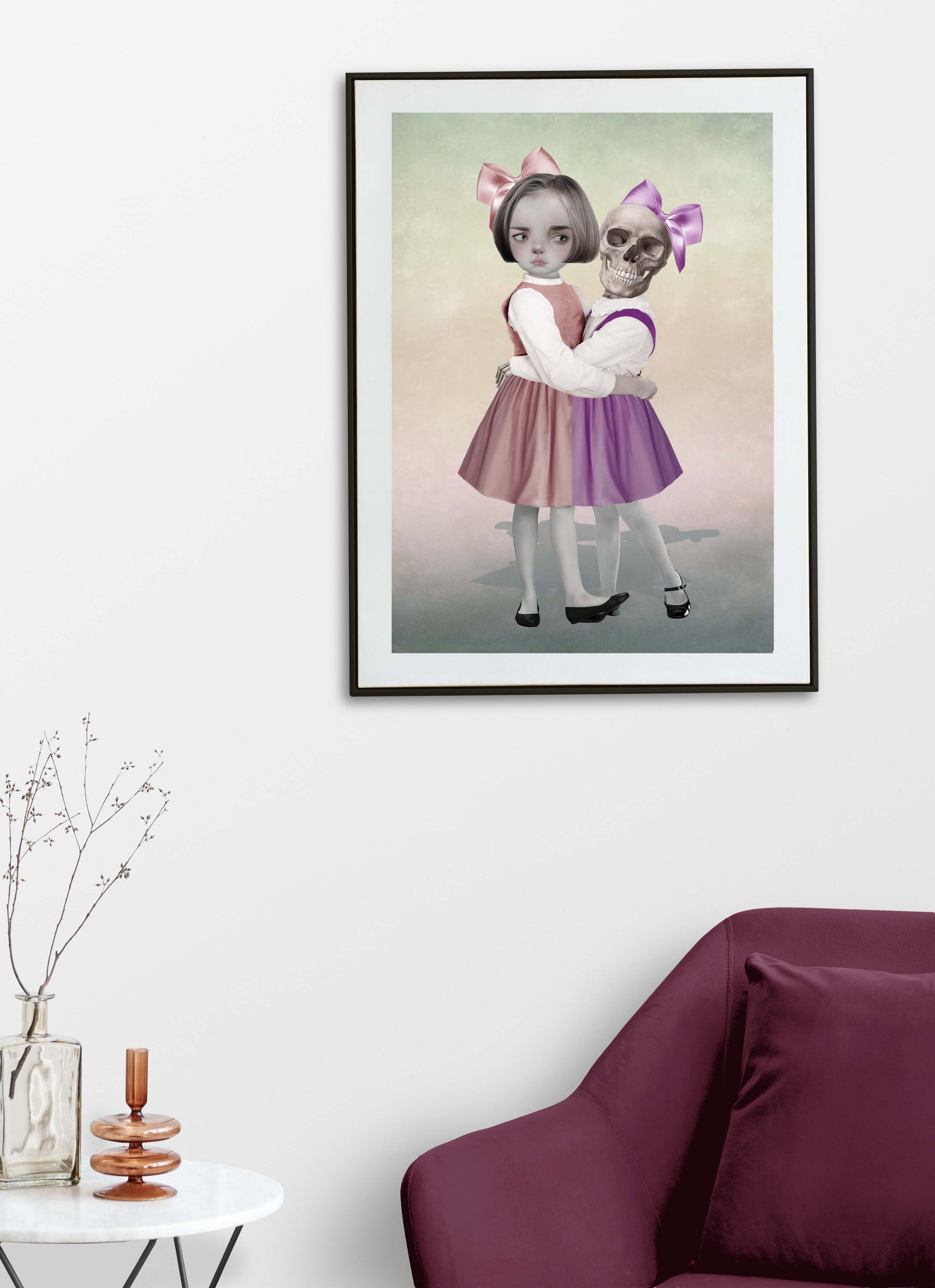 Skeleton Girl And Friend art print hanging on the wall of a modern living room. Perfect for adding a creepy cute touch to gothic or alternative home decor.