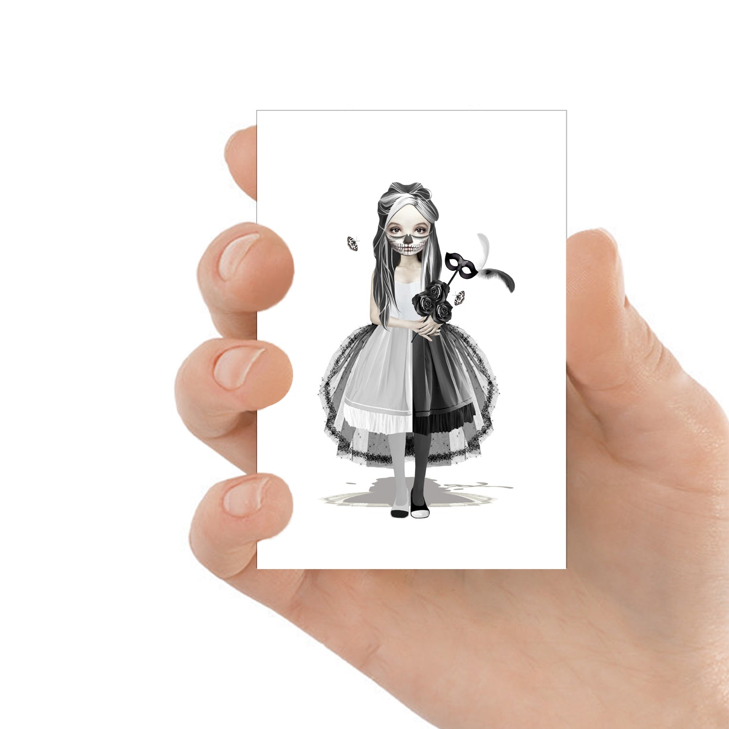 Skull Girl ACEO card held in hand, showcasing its intricate whimsical gothic design in a collectible format.