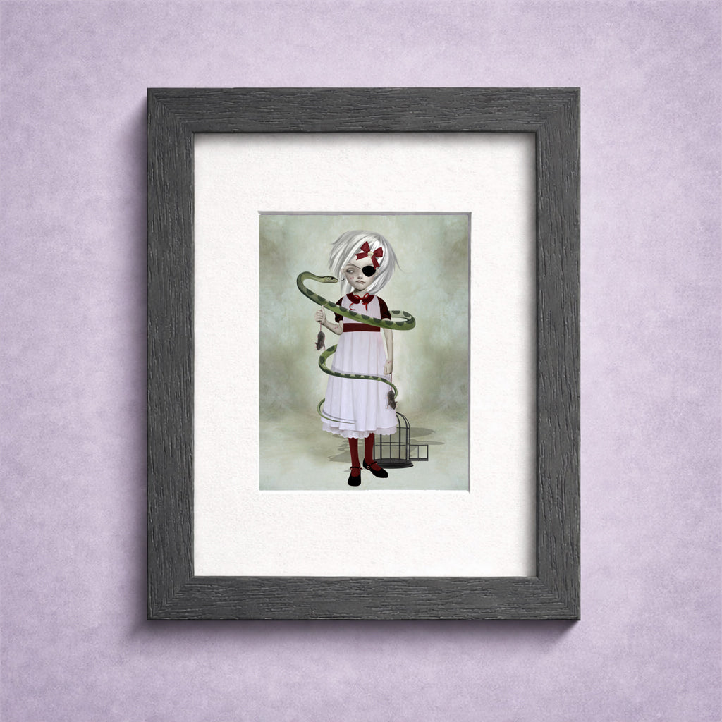 Framed artwork of a girl holding a snake on a light purple wall.