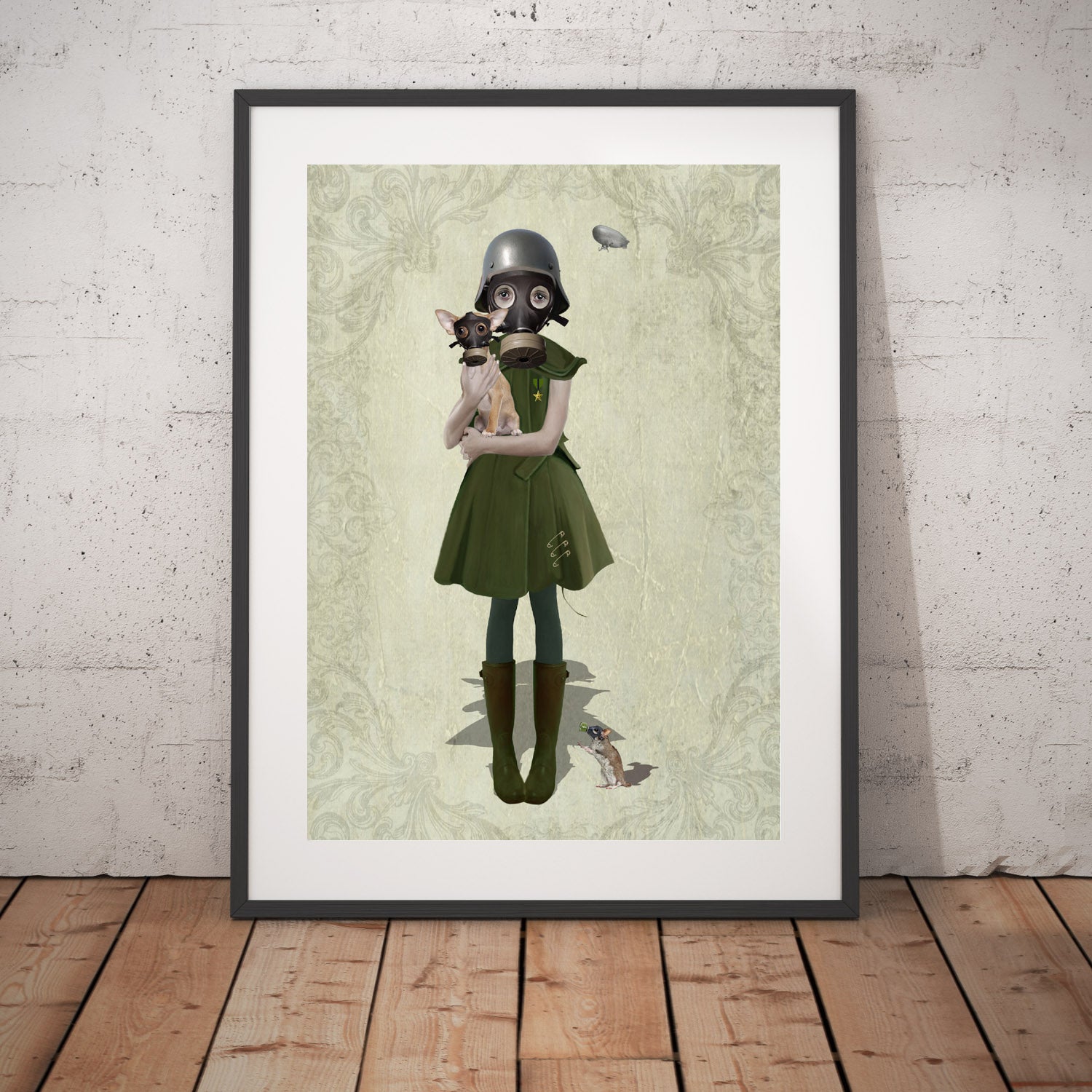 Soldier Girl and chihuahua art print in a black frame, standing against a white wall.