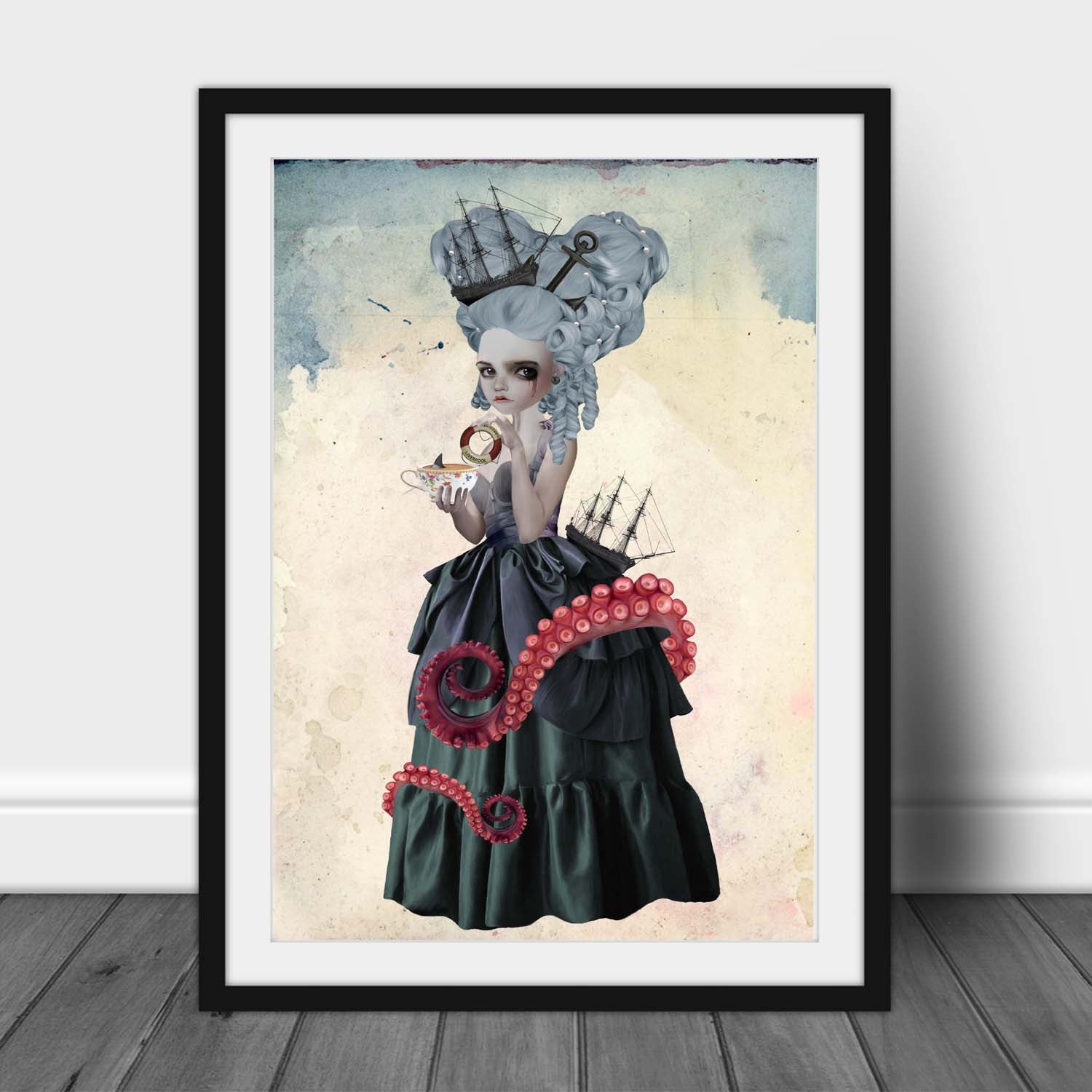 Framed artwork of the sea goddess Amphitrite dunking a buoy in a cup of tea whilst a miniature shark swims about.