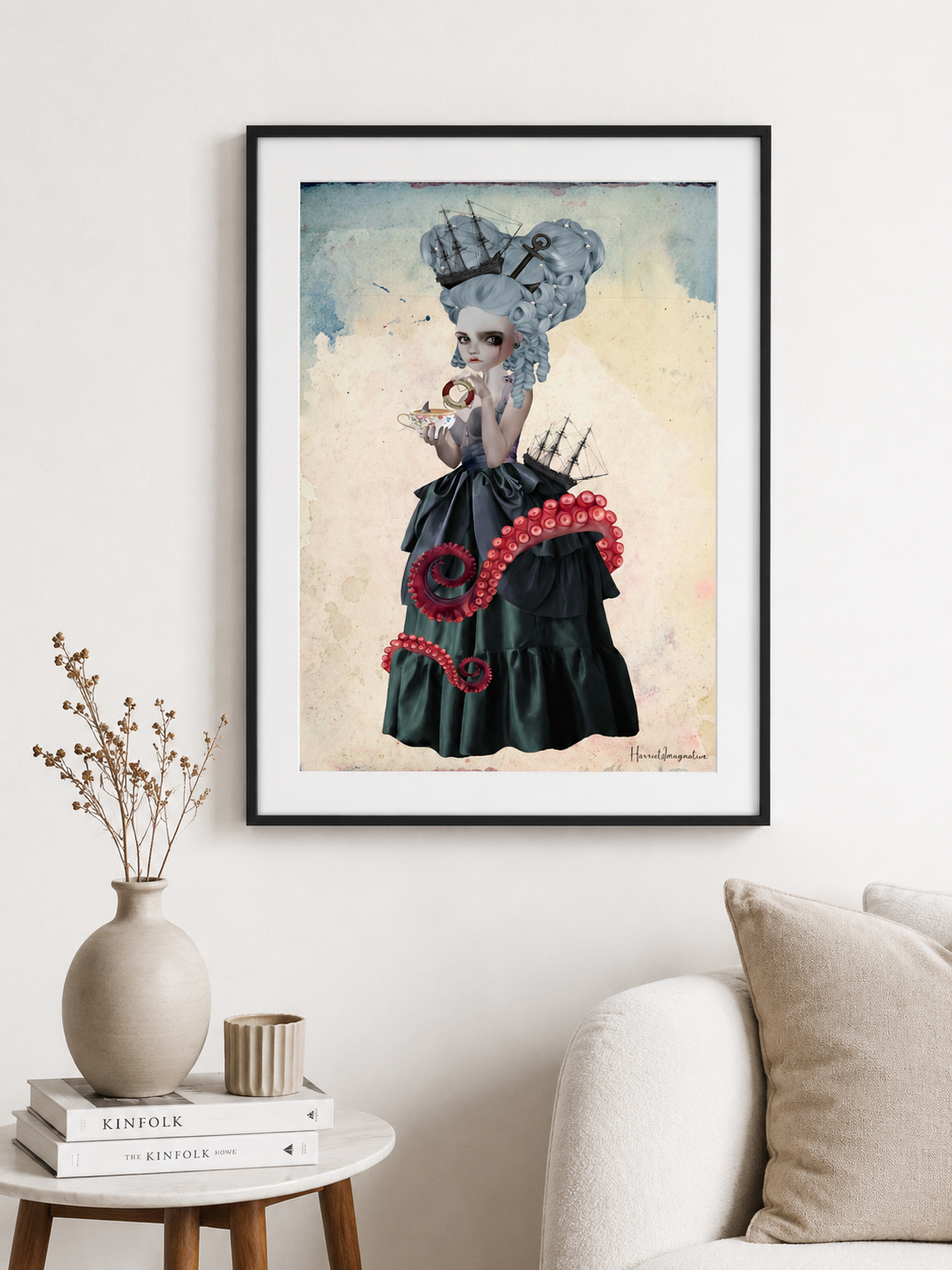Framed fantasy nautical art print on a living room wall for display features Amphitrite, a sea goddess with octopus tentacles and a tall ship.