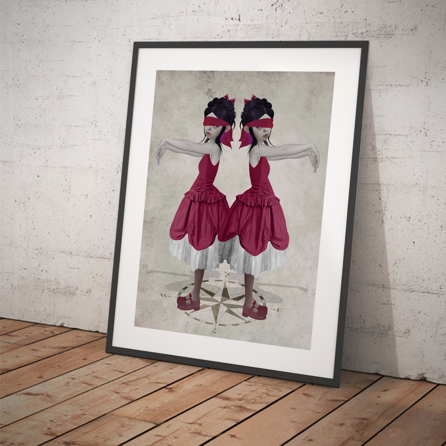 Surreal art print of a twin sisters blindfolded and compass, displayed in a large tilted black frame. This emotional dark mysterious artwork conveys depth and symbolism.