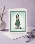 Greeting card with illustration of a woman on the phone with no mouth, surrounded by lavender flowers on a purple background.