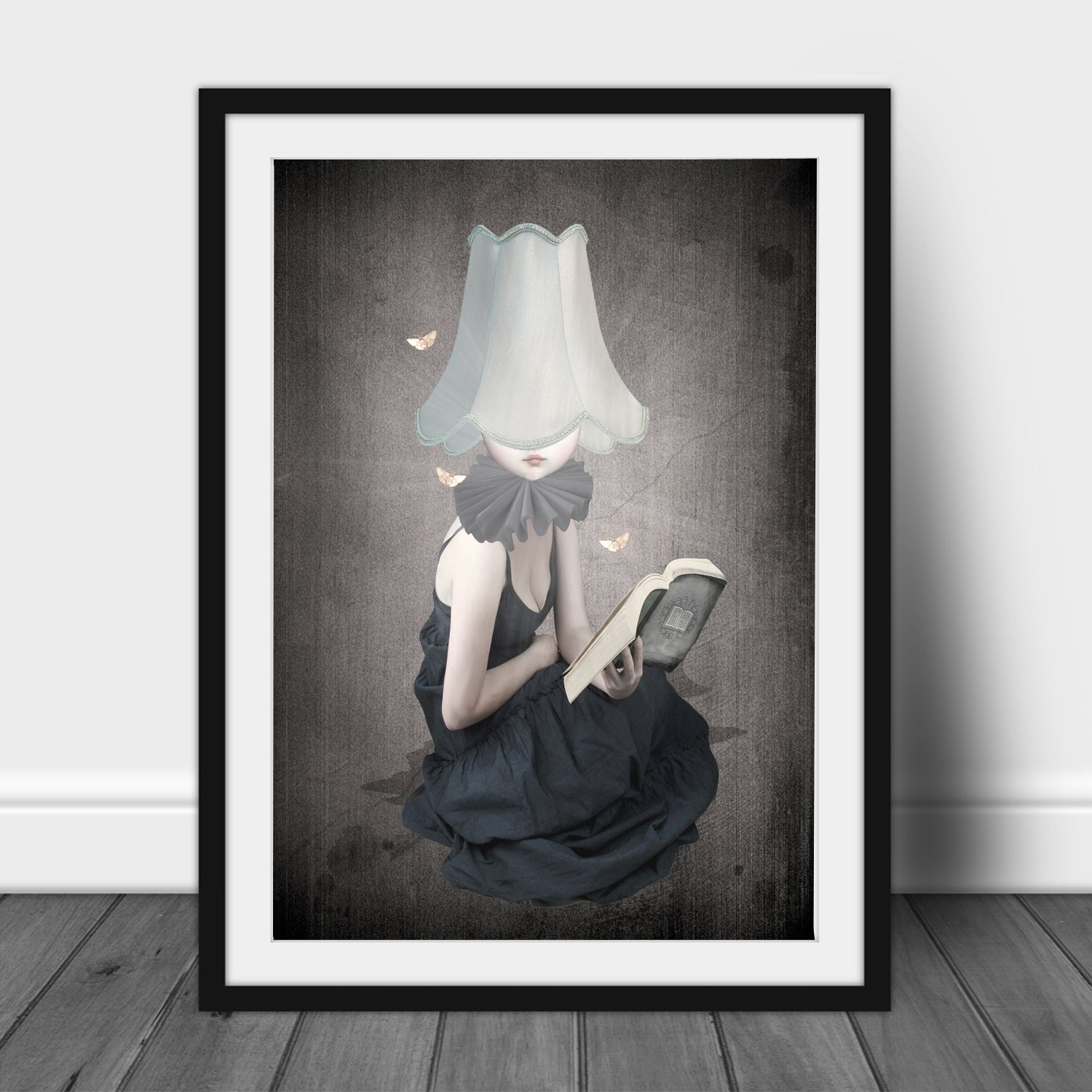 Surreal Moth Art Print. Immerse yourself in the darkness as a young girl by the light of her lampshade, loses herself in the pages of a book. Surrounded by fluttering moths,