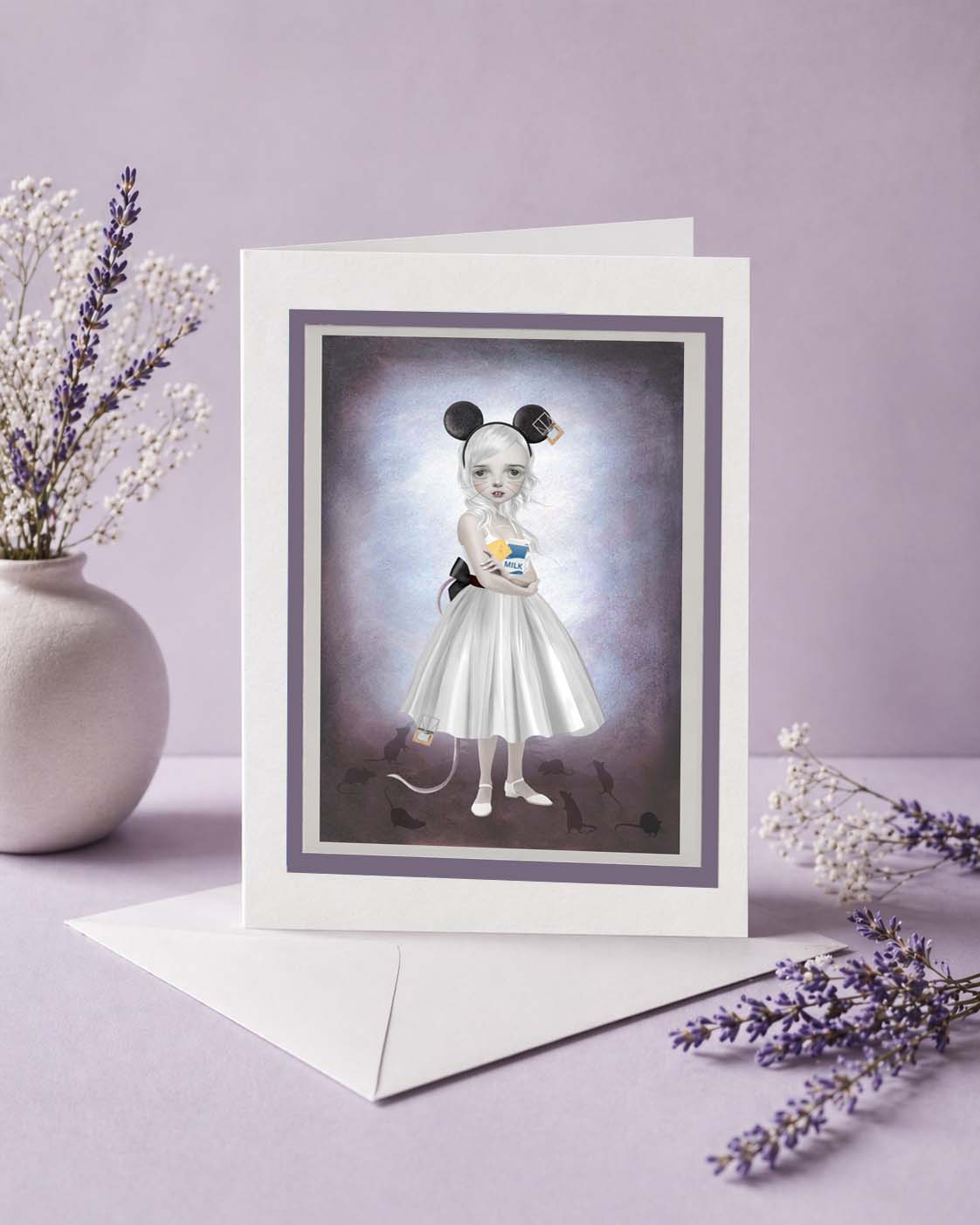Surrealist Mouse Girl" art greeting card. Featuring a striking pop-surrealist illustration of a wide-eyed girl with mouse ears, this card perfectly blends creepy-cute charm with gothic fairytale undertones.
