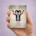 a surreal ACEO art card. Features twin girls with rose entwined anatomical hearts showing their sisterly bond.
