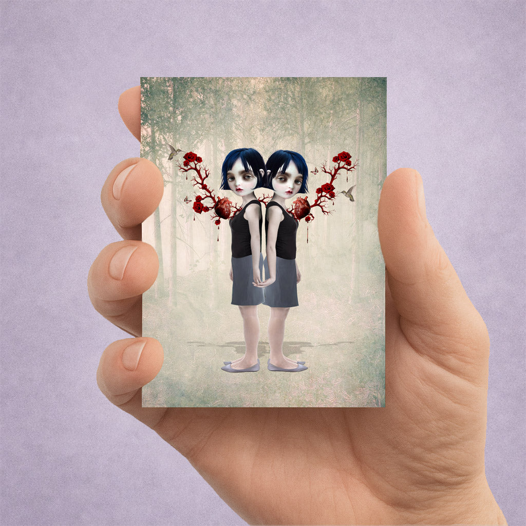 a surreal ACEO art card. Features twin girls with rose entwined anatomical hearts showing their sisterly bond.