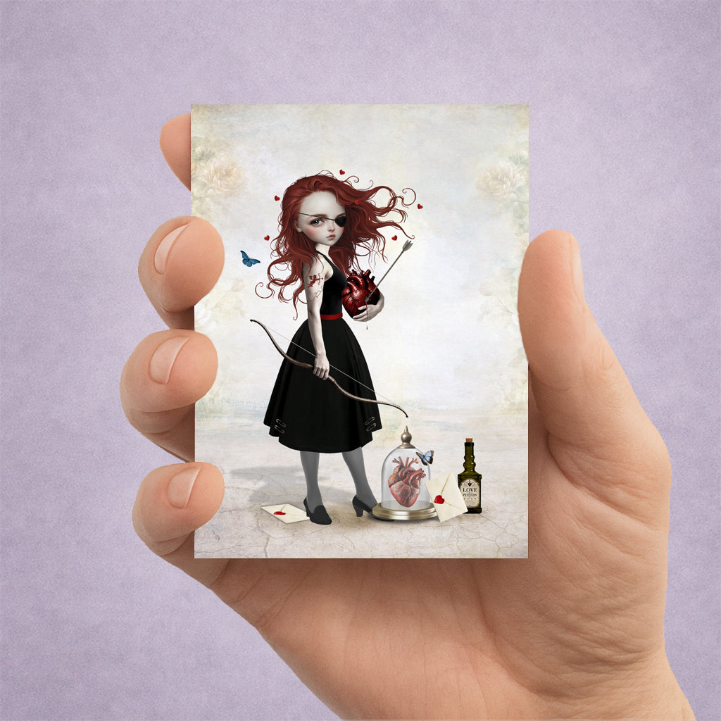 ACEO miniature art card of a redhead archer held in hand, featuring a surreal anatomical heart, bow and arrow, and love potion.