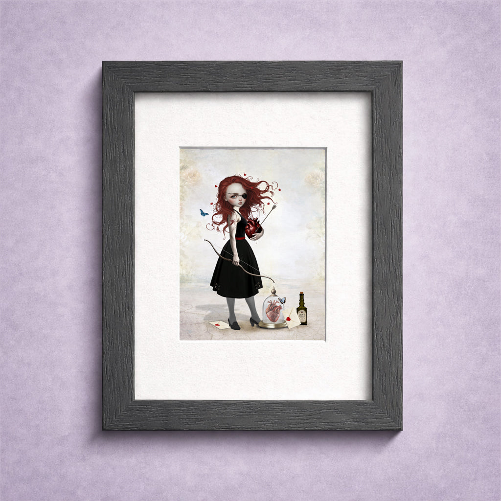 Framed ACEO miniature art card of a redhead archer held in hand, featuring a surreal anatomical heart, bow and arrow, and love potion.