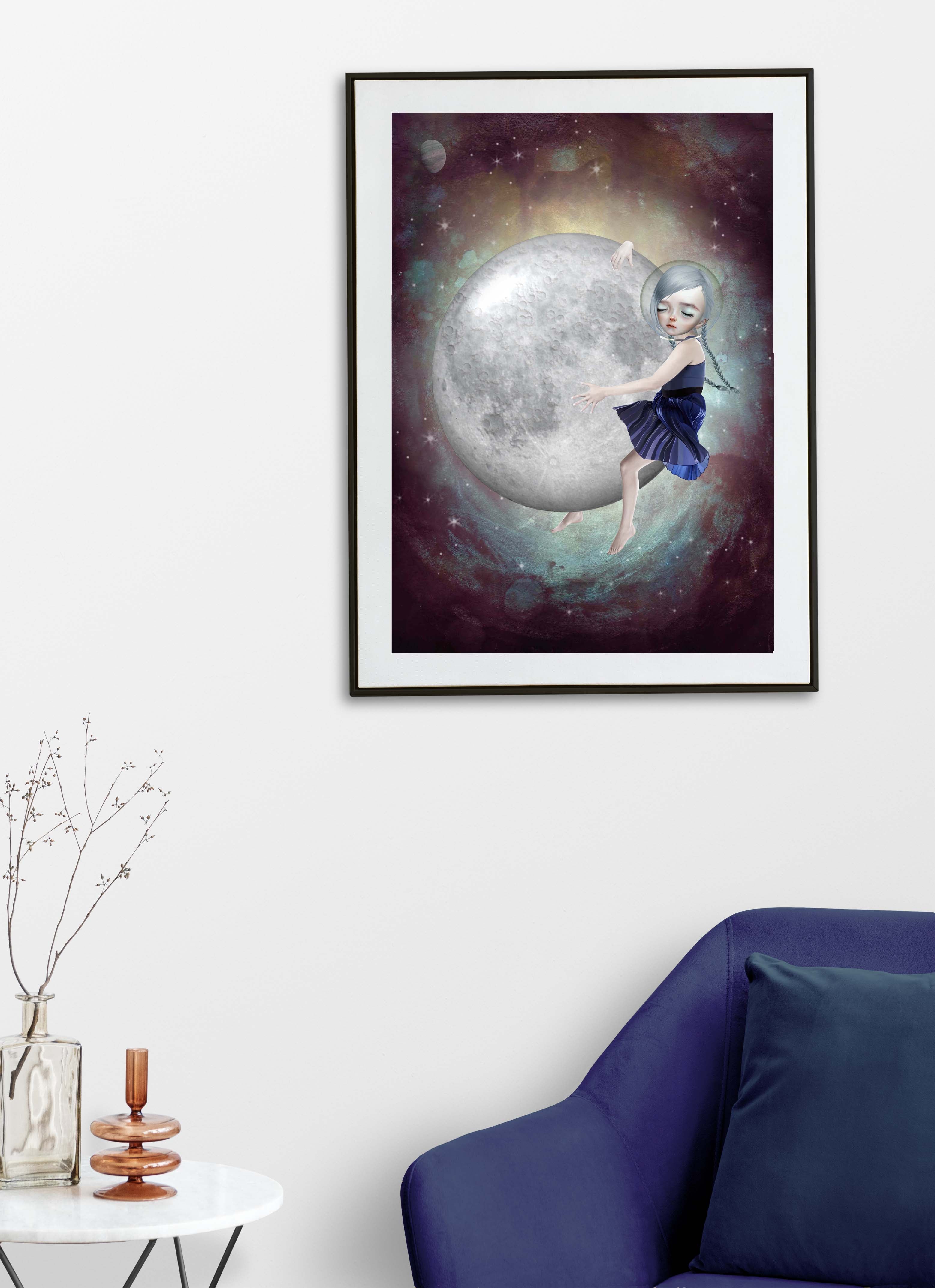 Fantasy space wall art featuring moon girl illustration displayed above blue chair in modern living room