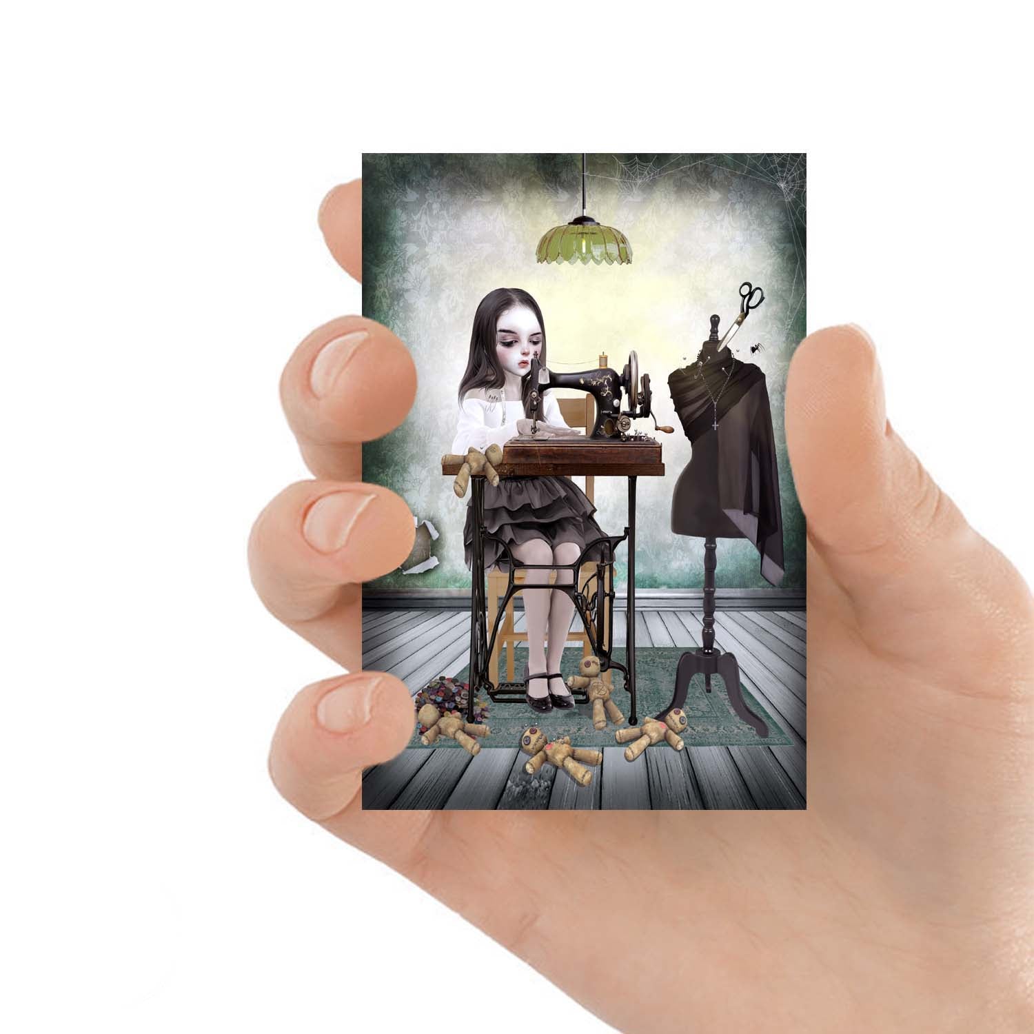 Gothic-inspired ACEO of a girl creating voodoo dolls on a sewing machine. 