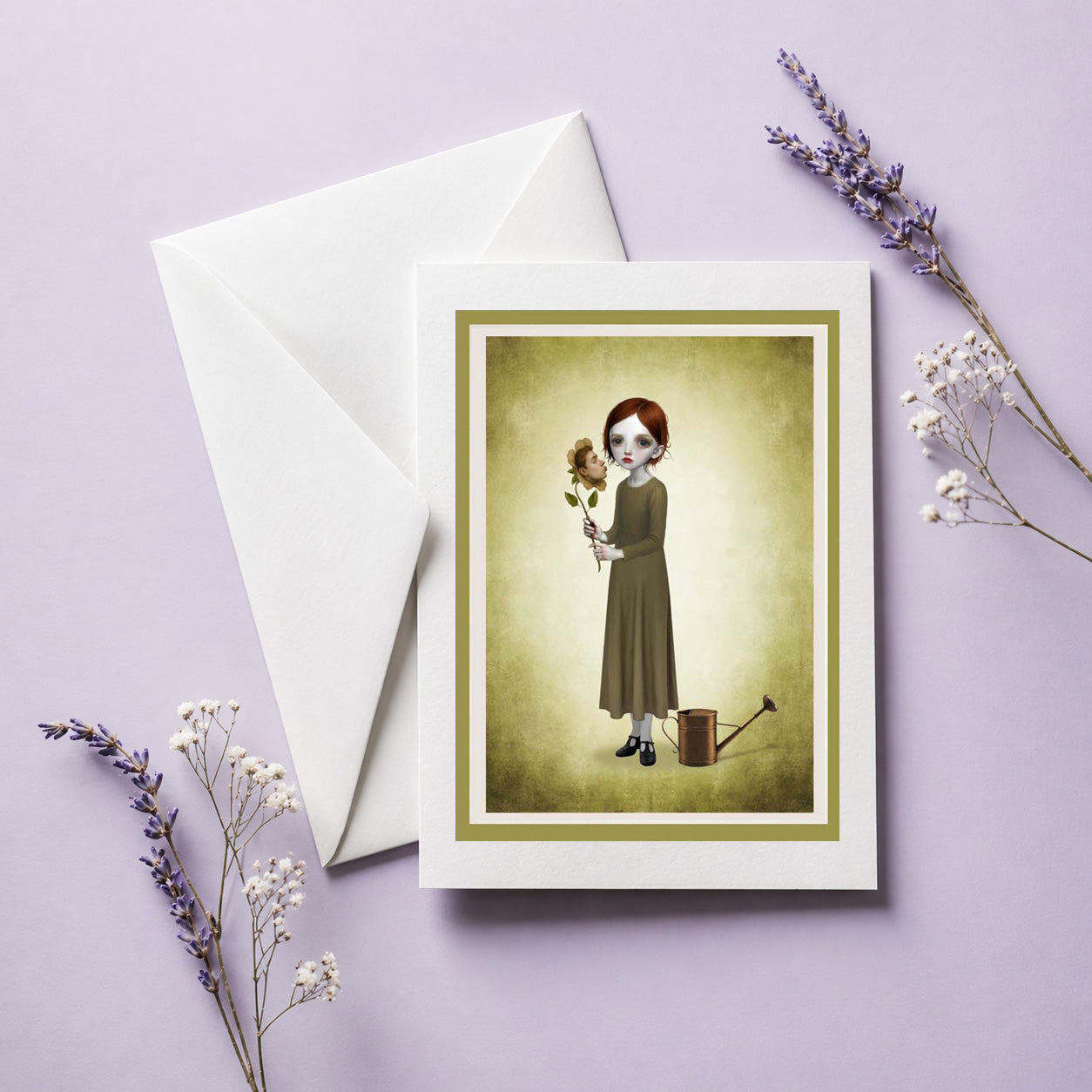 Greeting card with illustration of a girl holding a flower with face, accompanied by an envelope on a light purple background.