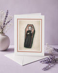  This gothic coffin girl art greeting card is blank inside and perfectly sized to double as framed wall decor.