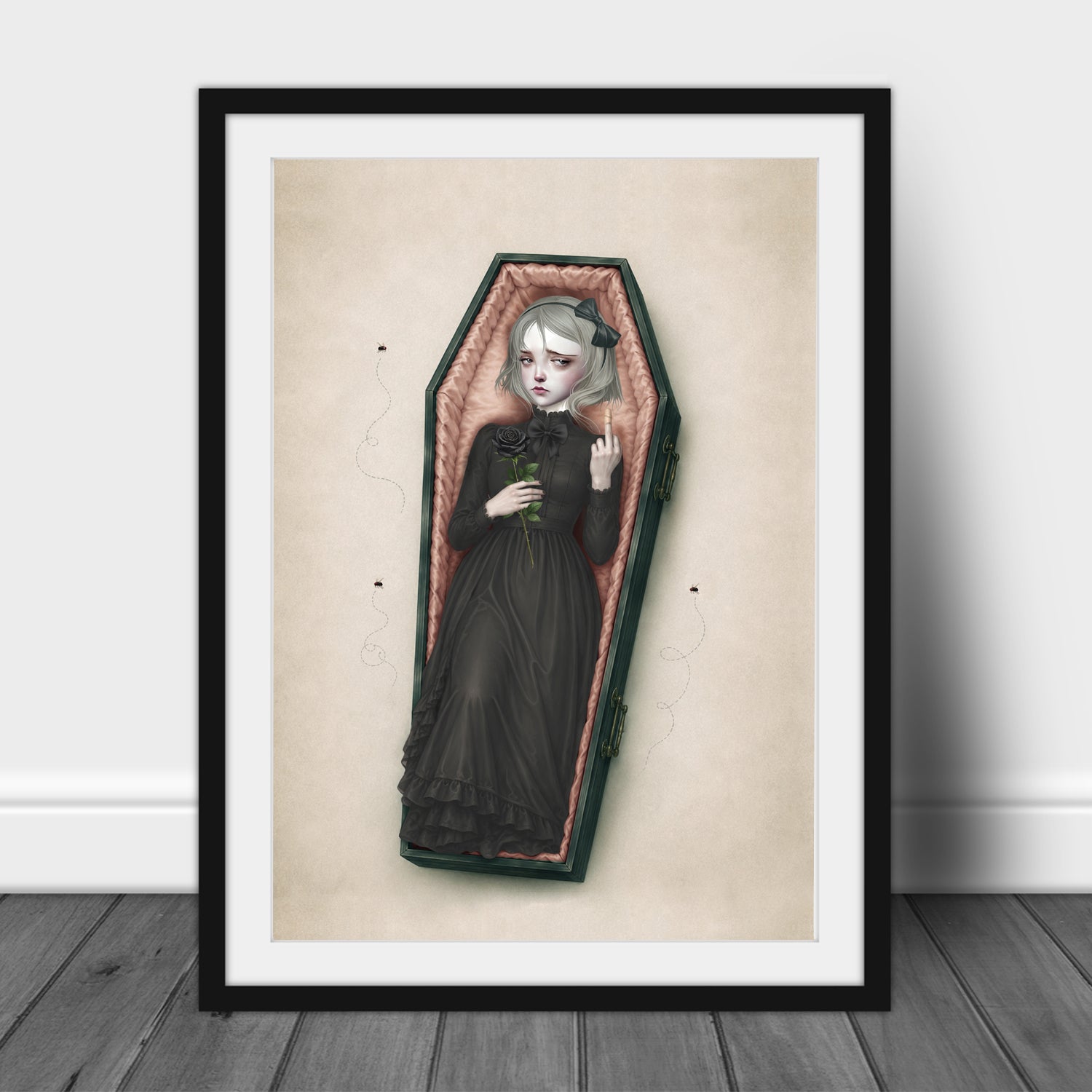 This gothic coffin girl art print displayed inside an A3 frame blends dark whimsy with surreal style—perfect for your alternative home decor. 