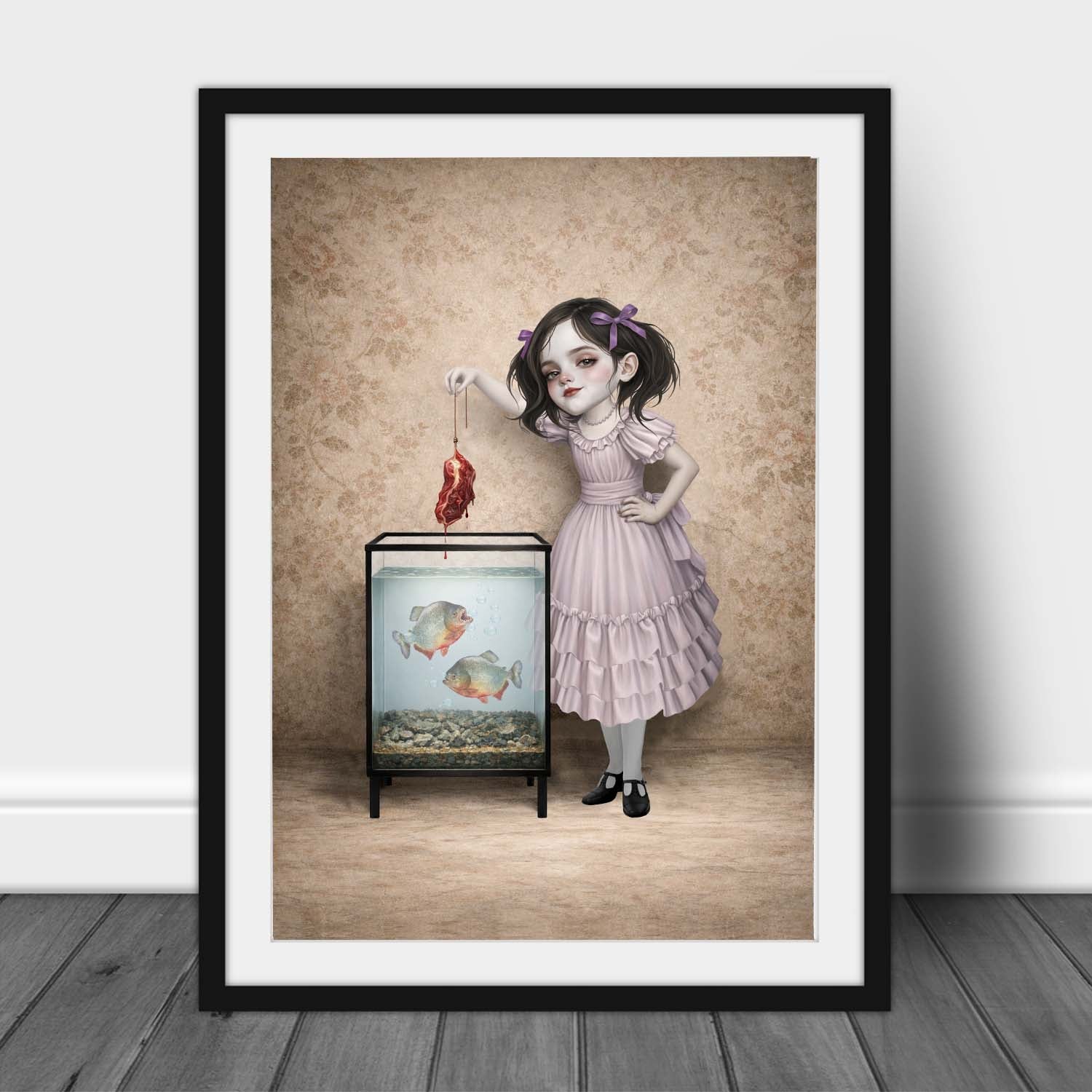 Surreal piranha art print in a black frame leaning against a white wall, highlighting the dark whimsigoth aesthetic and vintage-inspired textures.