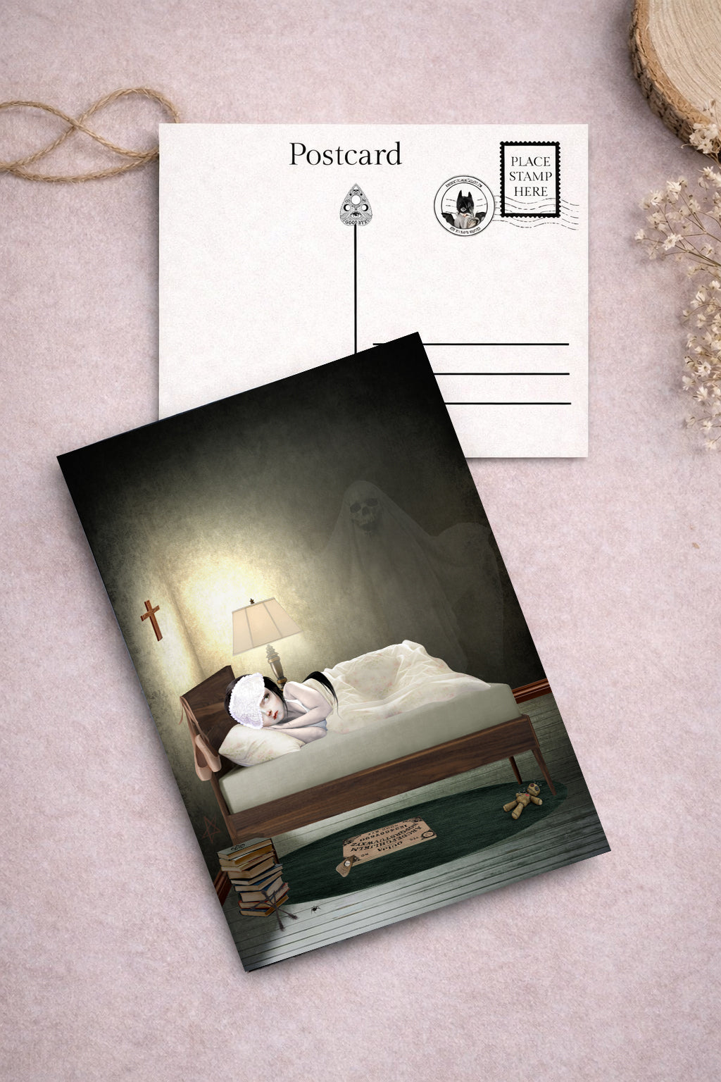 Postcard with a spooky scene of a girl in bed with ghost beside bed.