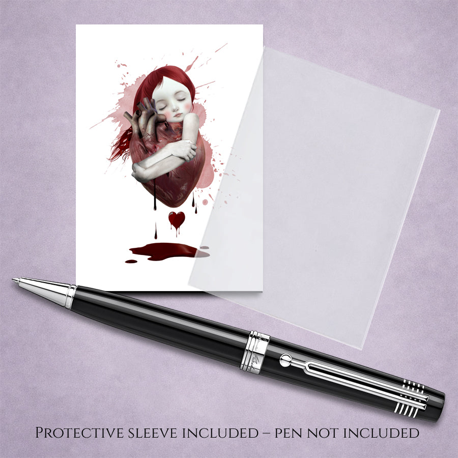 surreal ACEO art card and protective sleeve. Features a red hair girl hugging an anatomical heart.