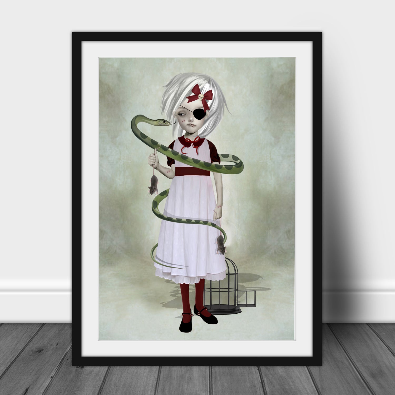 Framed surreal art print of a melancholic eyepatch girl with a snake and mice in creepy cute gothic style.
