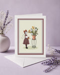 surreal lion greeting card features a high-quality reproduction of a girl tending to a potted plant where vibrant dandelions transform into roaring and sleeping lions.